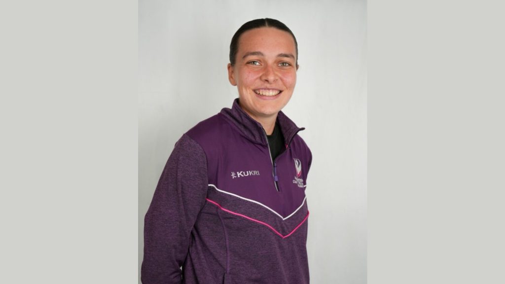 Close-up of Phoebe Cross wearing a Loughborough Sport top.