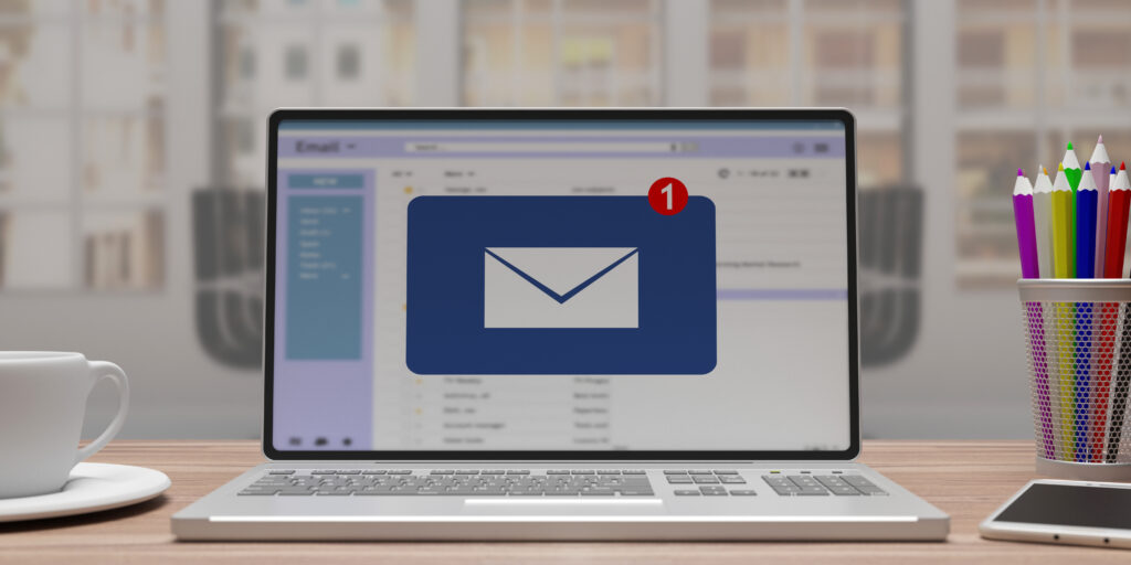 Email notification concept, one new inbox e mail, envelope with incoming message on computer laptop screen, business office desk background. 3d illustration