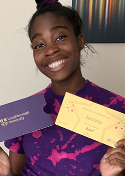 Jemima holding her 'Golden Ticket'