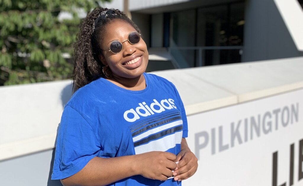 Morolake Macaulay (Rola) in front of Pilkington Library,