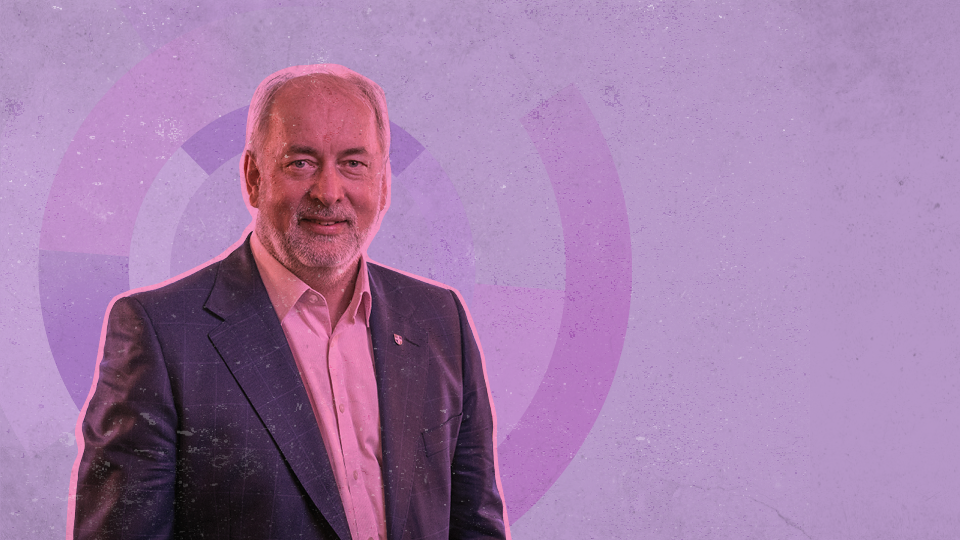 VC Professor Nick Jennings in front of a purple background.