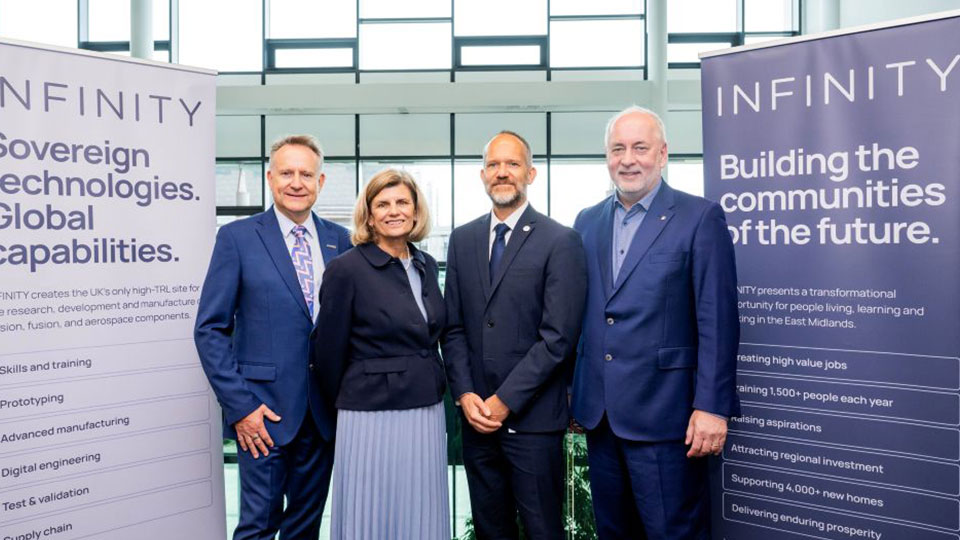 INFINITY leaders including Vice-Chancellor and President Professor Nick Jennings stood between INFINITY banners