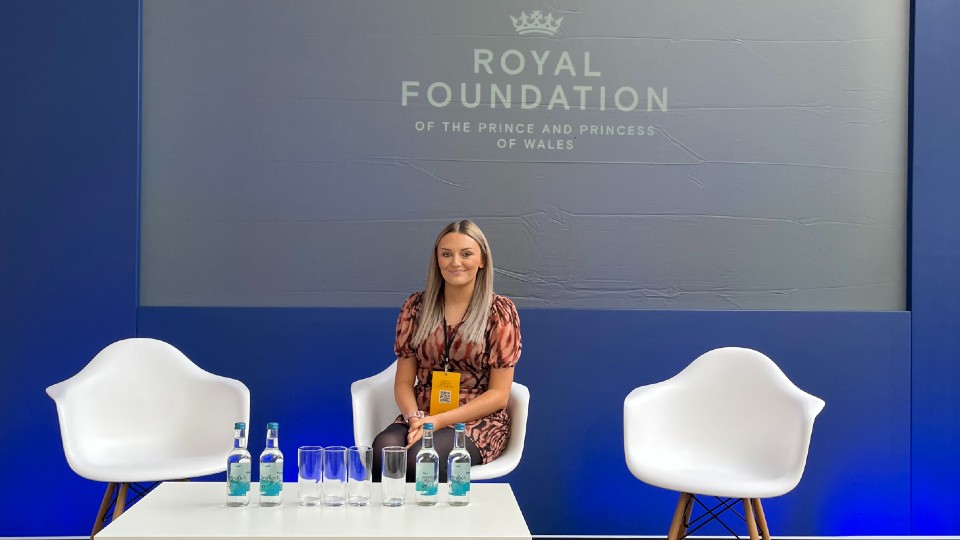 India sat behind a table at the Royal Foundation World Mental Health Day event.