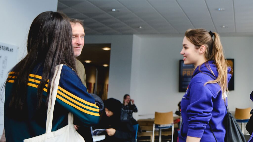 Katrina speaking to students and parents at an open day